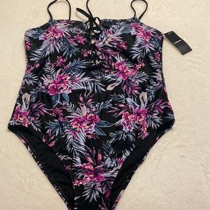 Bebe swimsuit in beautiful black and floral print.